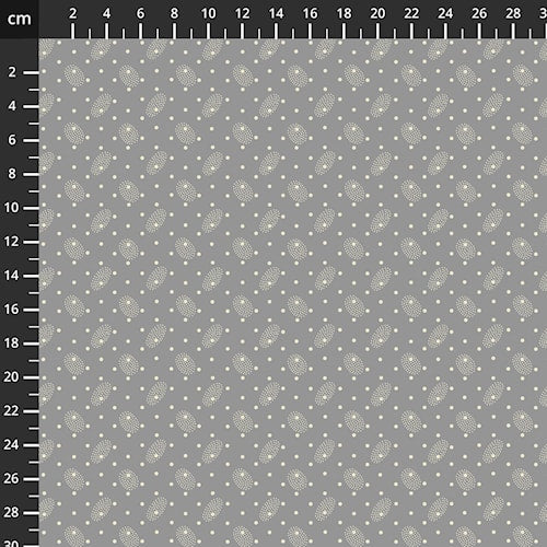 patchworkstof hvide prikker og elegante, lille paisley-agtige dråbemotiver på en varm stengrå/slate bund CPHquilt